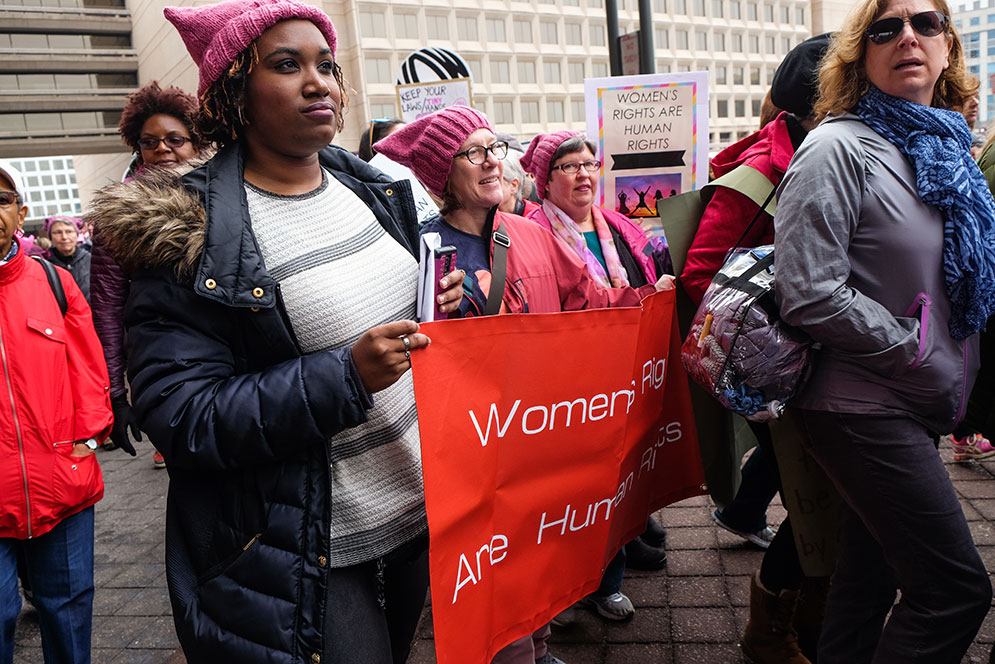 CAS was represented at the Women’s March on Washington, January 21, 2017, by staff members Tiffani Lewis-Lockhart (left) and Nancy Geourntas (right) and Dean Ann Cudd. Photo by Cydney Scott