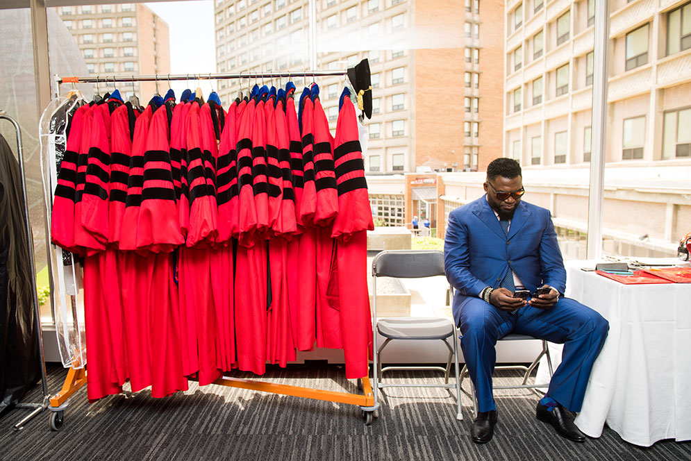 Former Red Sox slugger and 2017 honorary degree recipient David Ortiz (Hon.’17), waiting in the Case Center’s Eilberg Lounge VIP robing room
