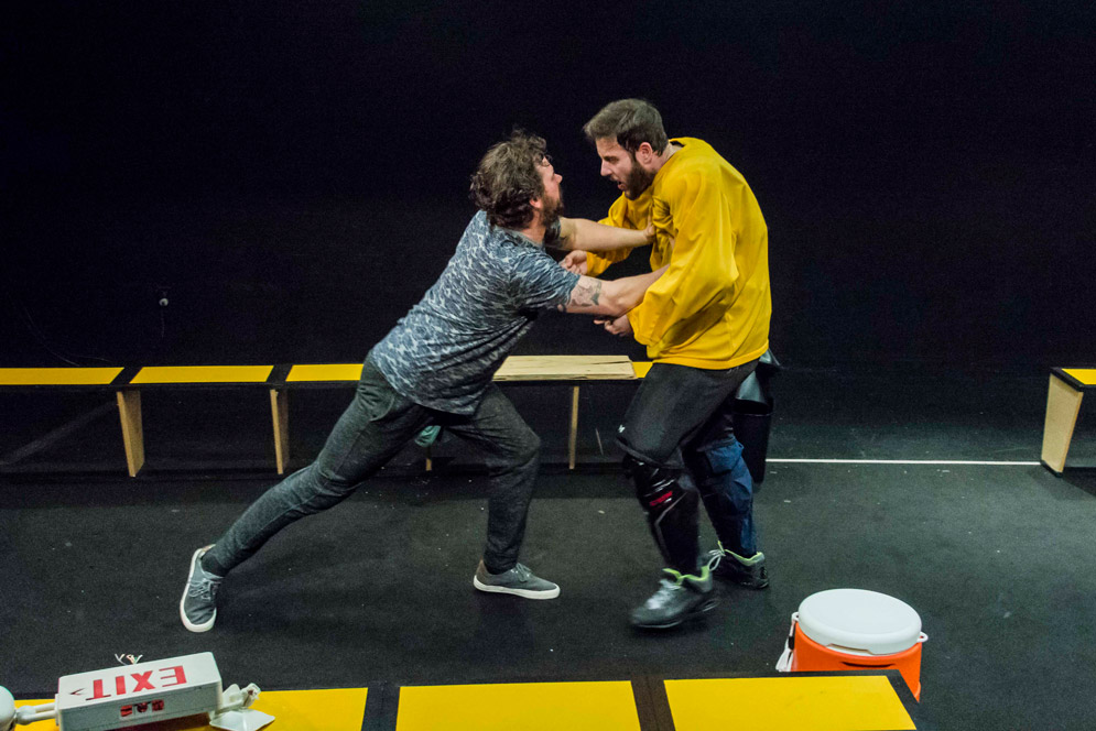 Anthony Goes, as Odie (left), struggles with Greg Maraio, as Moose