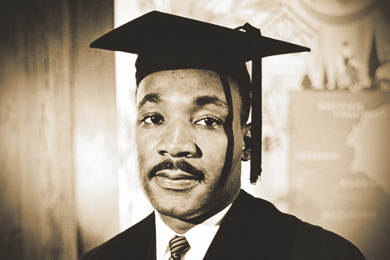 Portrait of Martin Luther King Jr, in a graduation robe and mortarboard hat upon receiving an honorary degree from Boston University in 1958