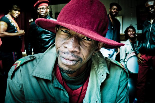 The musical group Jupiter & Okwess pose for a photo