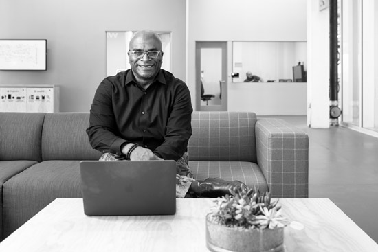 Anthony Harris poses in a Facebook office