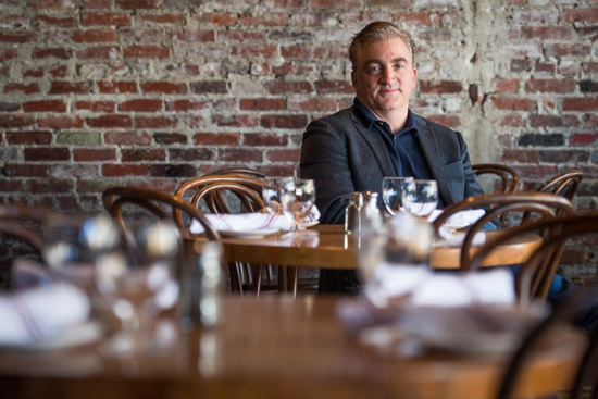 portrait of Eric Aulenback in one of his restaurants