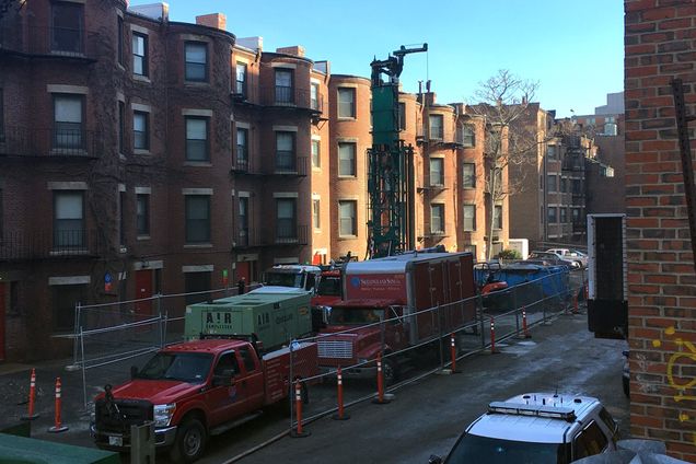 The first new geothermal wells—each 1500 feet deep—have been drilled into the subterranean layers of the new BU Data Sciences Center. Courtesy of Chris Kenney