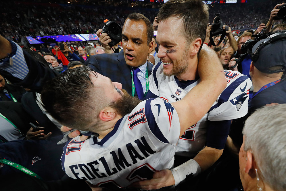 New England Patriots quarterback Tom Brady and exuberant Super Bowl LIII MVP Julian Edelman after the Pats’ 13-3 victory over the Los Angeles Rams Sunday. Photo by Kevin C. Cox/Getty Images.