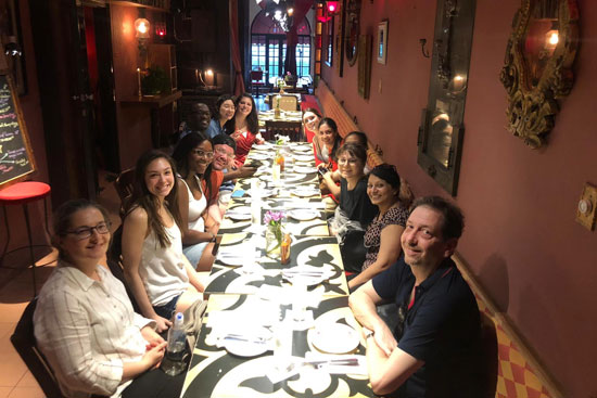 BU students sitting around a dinner table