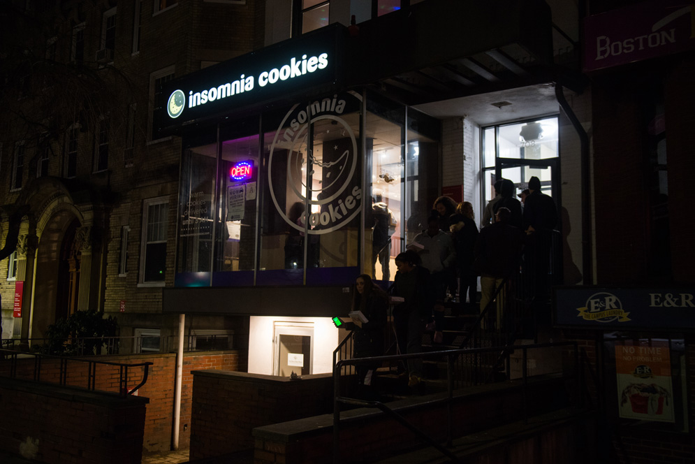 Students form a line outside of Insomnia cookies