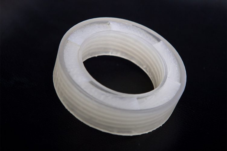 Detail photo of a ring shaped noise cancellation device built using an acoustic metamaterial both developed by Boston University engineers.