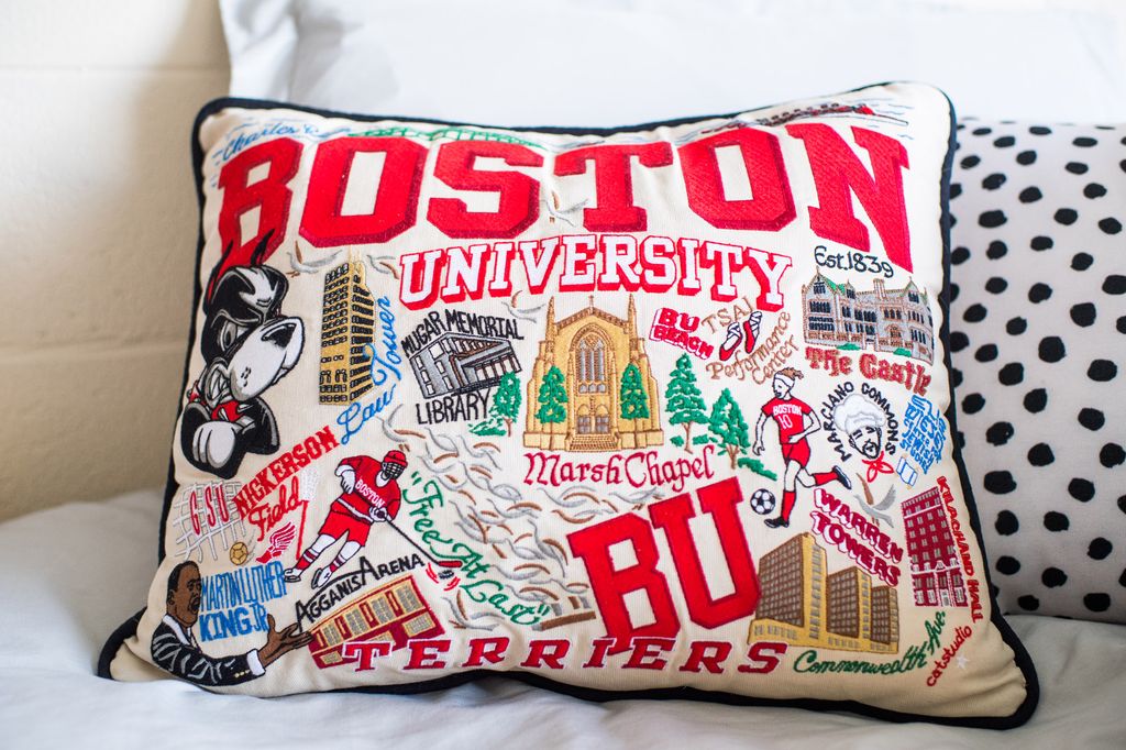 A Boston University themed embroidered pillow
