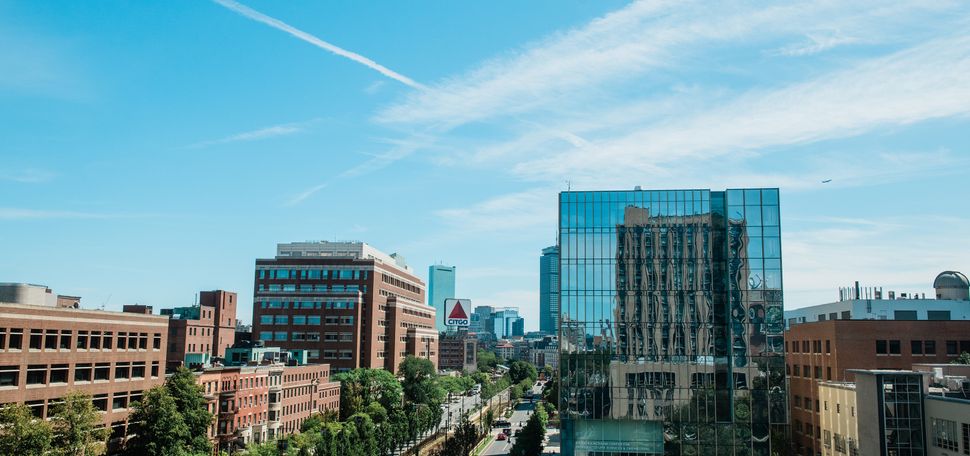 A view down Commonwealth Ave looking towards Kenmore Square from the roof of Warrent Towers dorm on the Boston University Charles River campus.