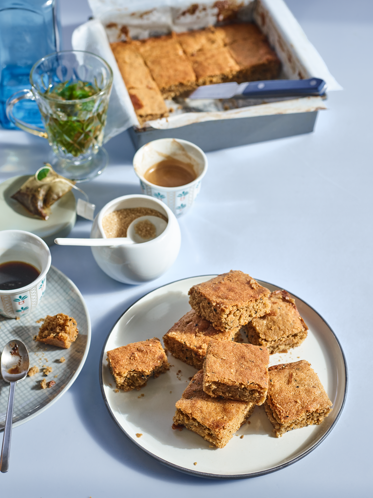 Chewy Tahini Blondies stacked on a plate