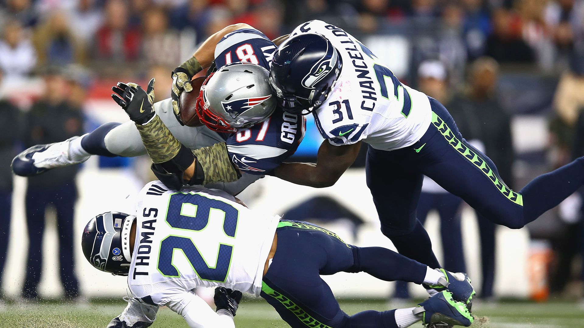 Patriots player Rob 'Gronk' Gronkowski gets tackled during a game against the Seattle Seahawks.