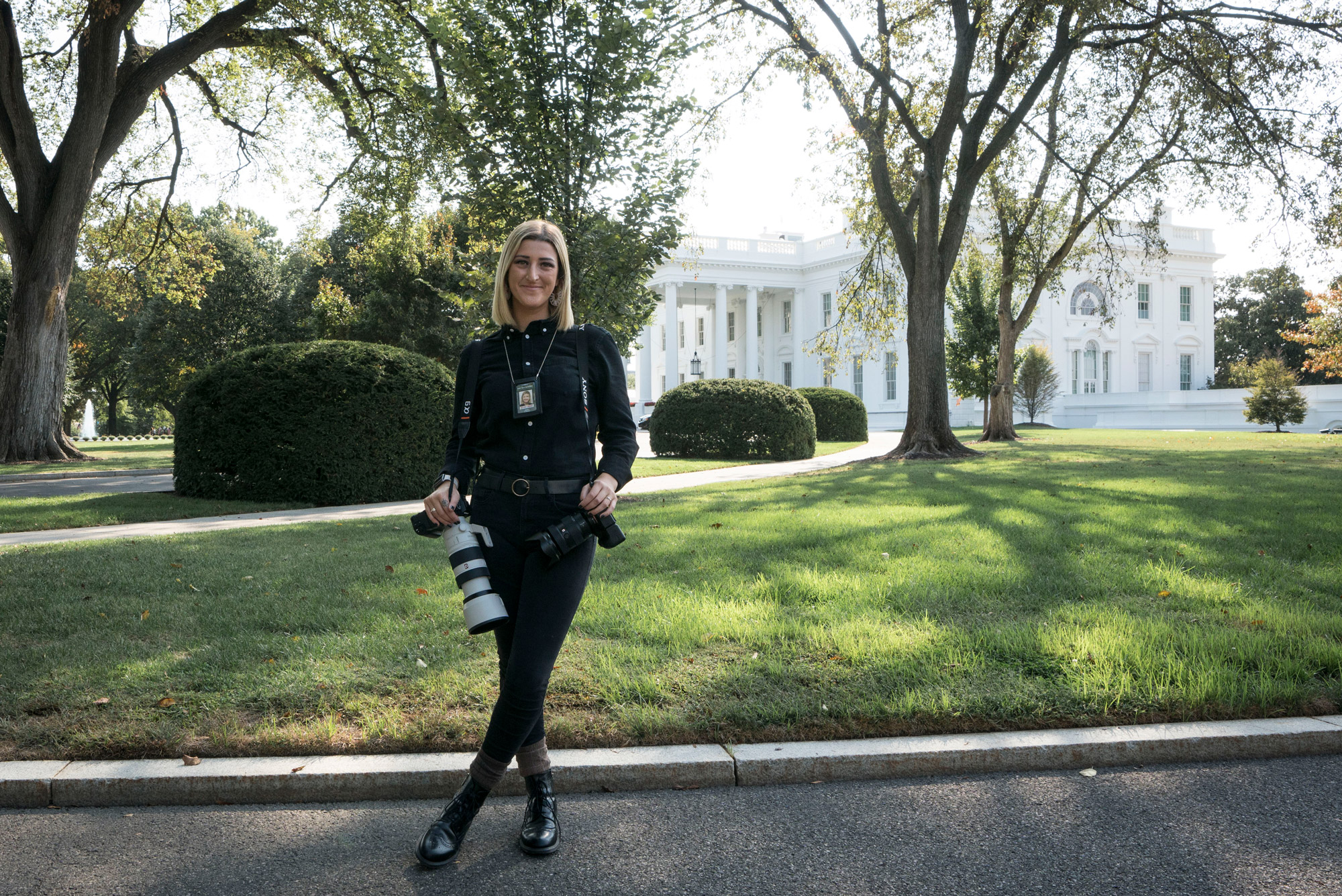 Sarah Silbiger (COM’18) holds her cameras while posing for a photo outside the whitehouse
