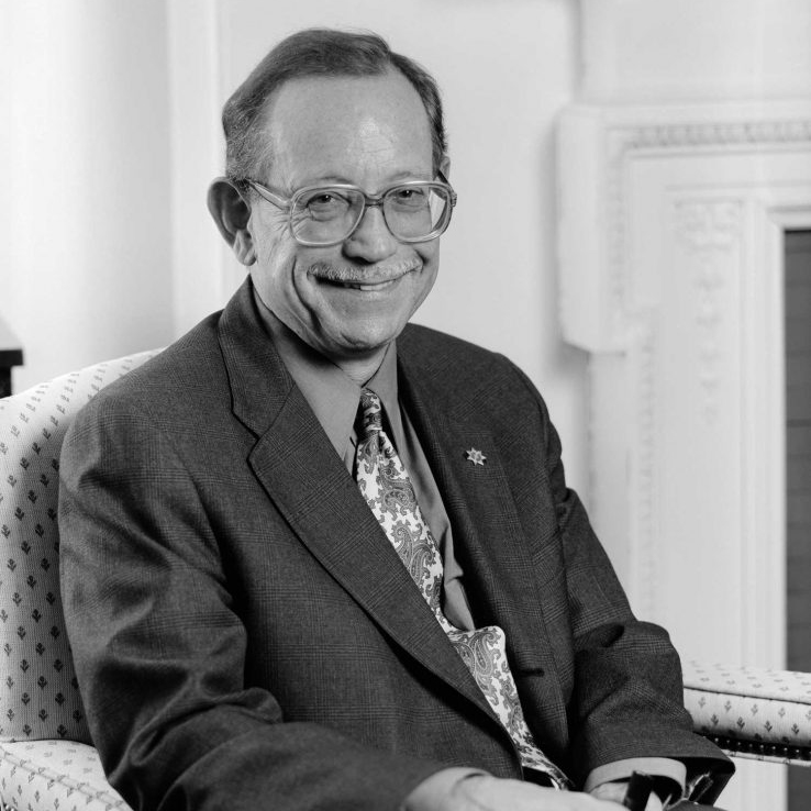 Black and white portrait of Edwin J. Delattre, Dean Emeritus of Wheelock College