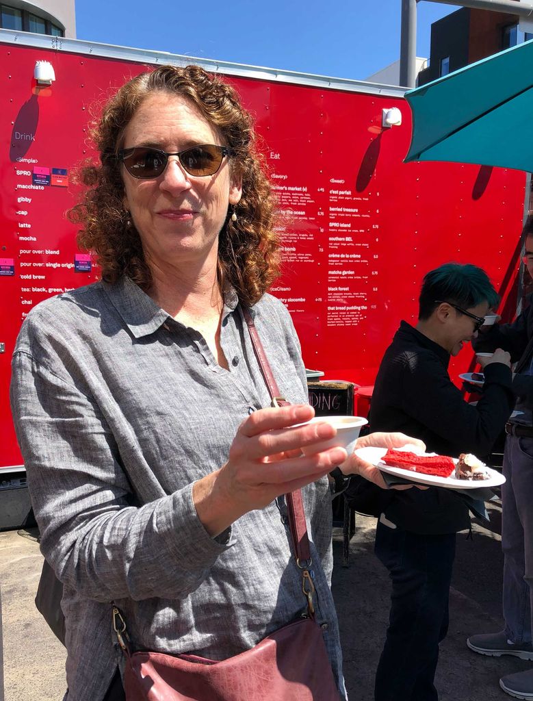 Kara Nielsen (MET’06) samples coffee drinks and the red velvet waffle at SPRO, a coffee truck in a San Francisco food truck park