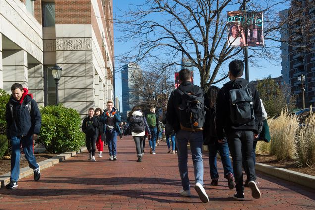 Photo of students walking along Comm Ave at BU.