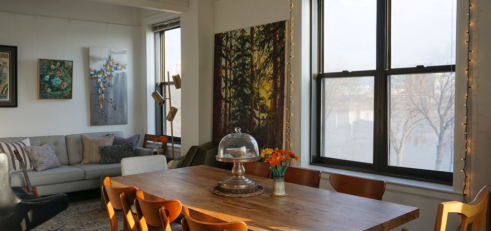 Photo of the kitchen in Kinh Vu’s apartment, where he normally hosts open hours for students, sits empty since COVID-19 cleared the campus. Sunlight pours in from the windows.