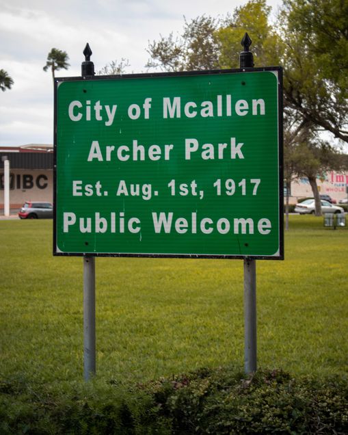 A photo of a sign that reads "City of Mcallen, Archer Park"