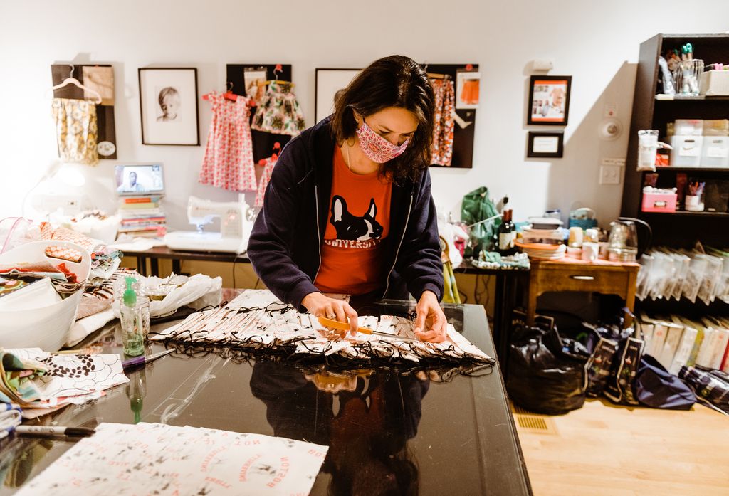 Photo of Annissa Essaibi-George sewing.