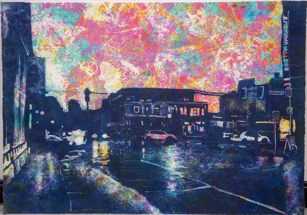 Photo of a print by Olivia Holdsworth (CFA’21)’s that features a gloomy intersection with a few cars in dark blue, with a sky colored pink, yellow and teal.