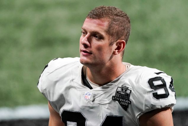 A photo of Carl Nassib with his helmet off on the field