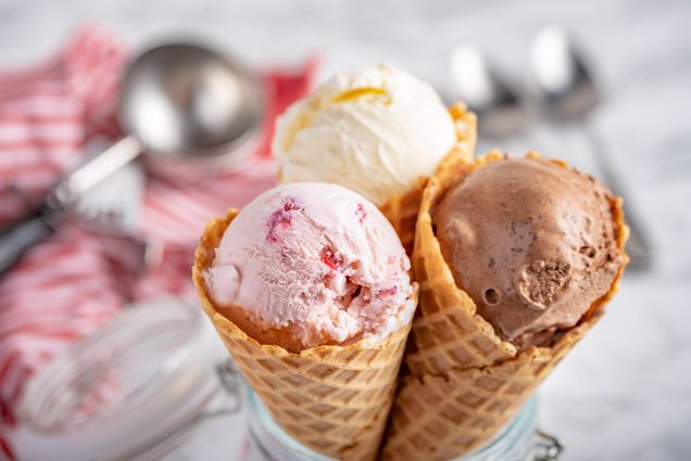 A photo of three scoops of ice cream
