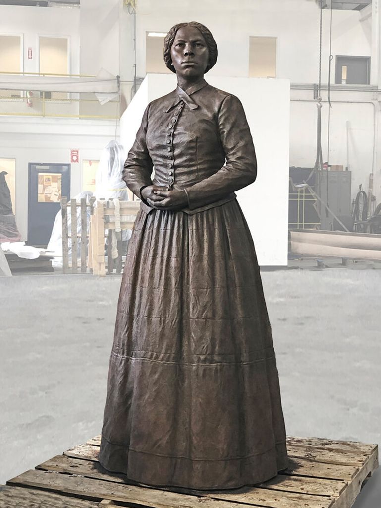 a bronze statue of Harriet Tubman located in Maryland
