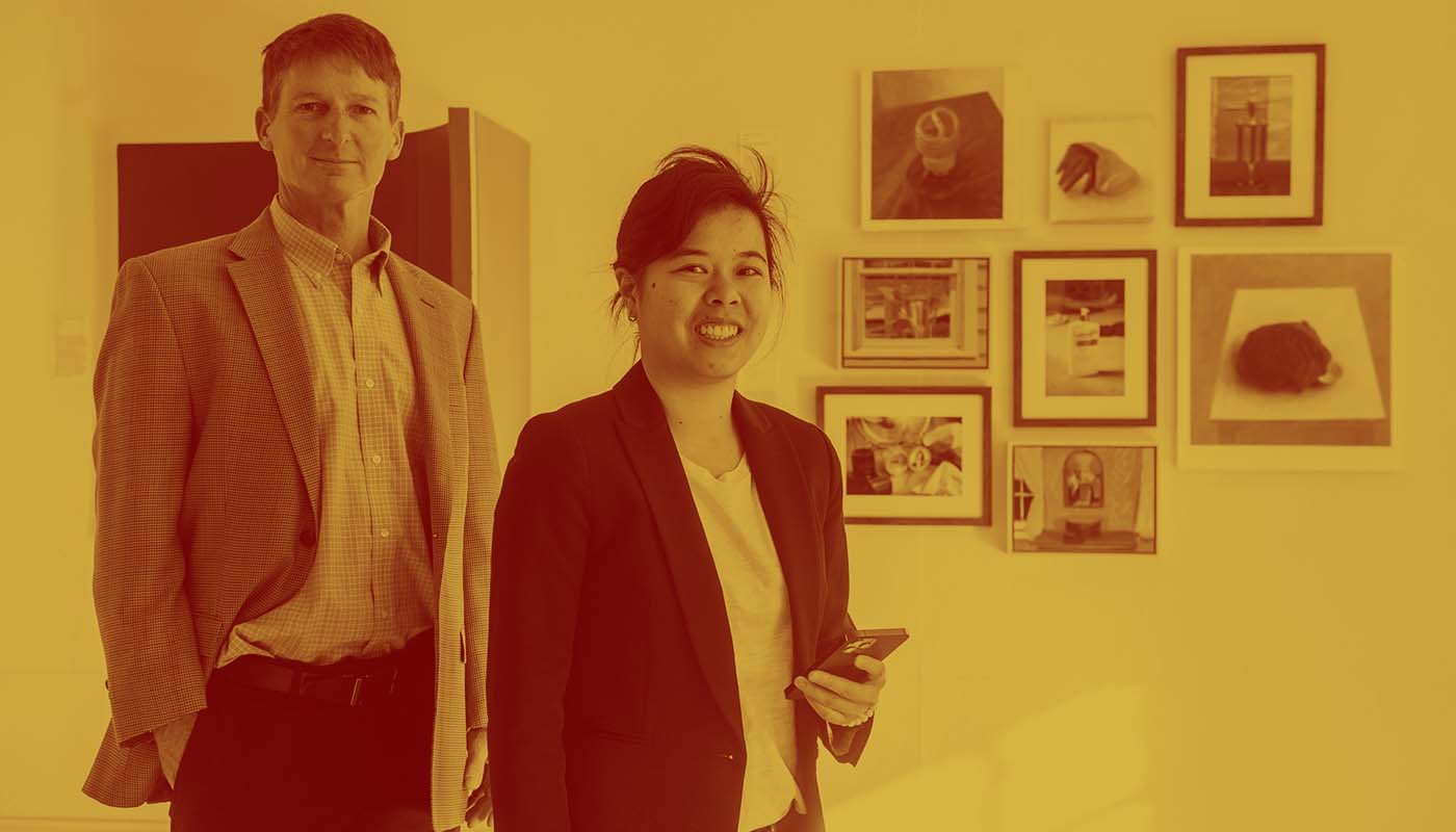 Emily Lam (ENG'14,'16,'20) and ENG Professor Thomas Little started tech company Rtangent, whose technology provides virtual tours led by a a live interpreter/guide. They were photographed at Gallery 263 in Cambridge, for which they created a tour. Photo by Cydney Scott for Boston University Photography
