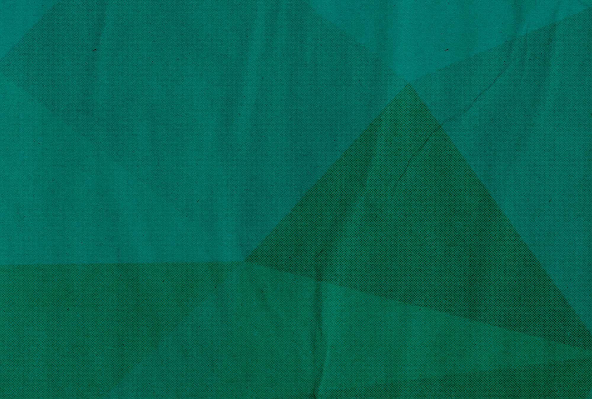 Geometric pattern with triangles of different shapes. Image has a dark teal overlay that makes the design appear as though it was poorly printed.