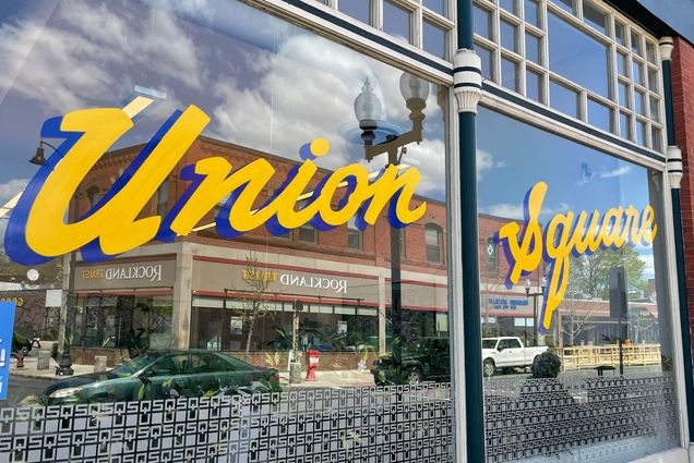 A picture of a sign in Union Sqaure in Somerville that reads "Union Sqaure"