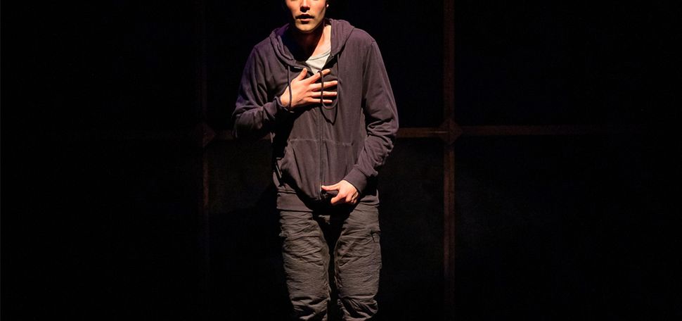 Mishka Yarovoy (CFA’23) stands barefoot centerstage in the scene where his two characters meet in SpeakEasy Stage’s production of Matthew Lopez’s Tony Award–winning drama, The Inheritance. Photo by Nile Scott Studios