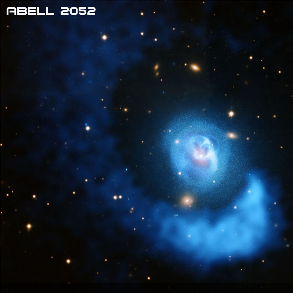 An artist's rendering of ABEL 2052, a galaxy cluster 480 million light years away from earth