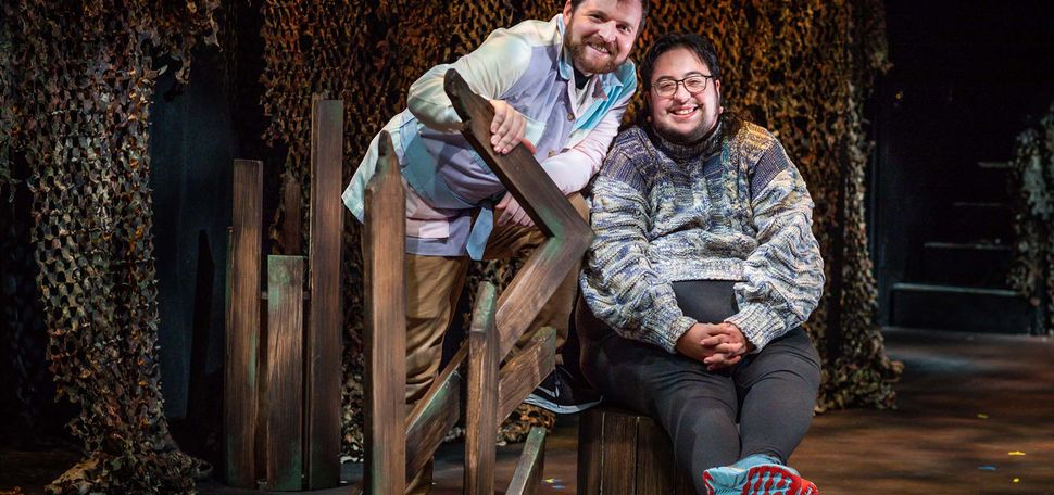 Director Shamus (left) and Playwright J.C. Pankratz pose for a photo at Boston Playwrights Theater on the set of Pankratz’s dark comedy Eat Your Young. Photo by Jackie Ricciardi