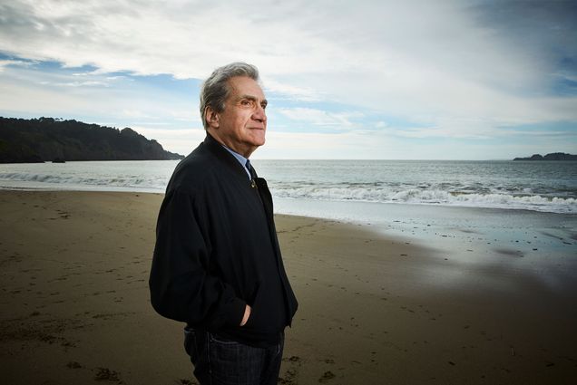 “I had the good luck to be raised among expert joke-tellers, complainers, arguers, schmoozers, boasters, and liars,” Pinsky says in his new memoir, Jersey Breaks. Photo by Gabriela Hasbun. Pinsky stands looking out over an ocean beach on a cloudy day
