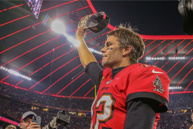 Tampa Bay Buccaneers quarterback Tom Brady (12) waves to the stands as he walks off the field after an NFL football game against the Seattle Seahawks on Nov. 13, 2022, in Munich. The Buccaneers defeated the Seahawks 21-16. (AP Photo/Gary McCullough)