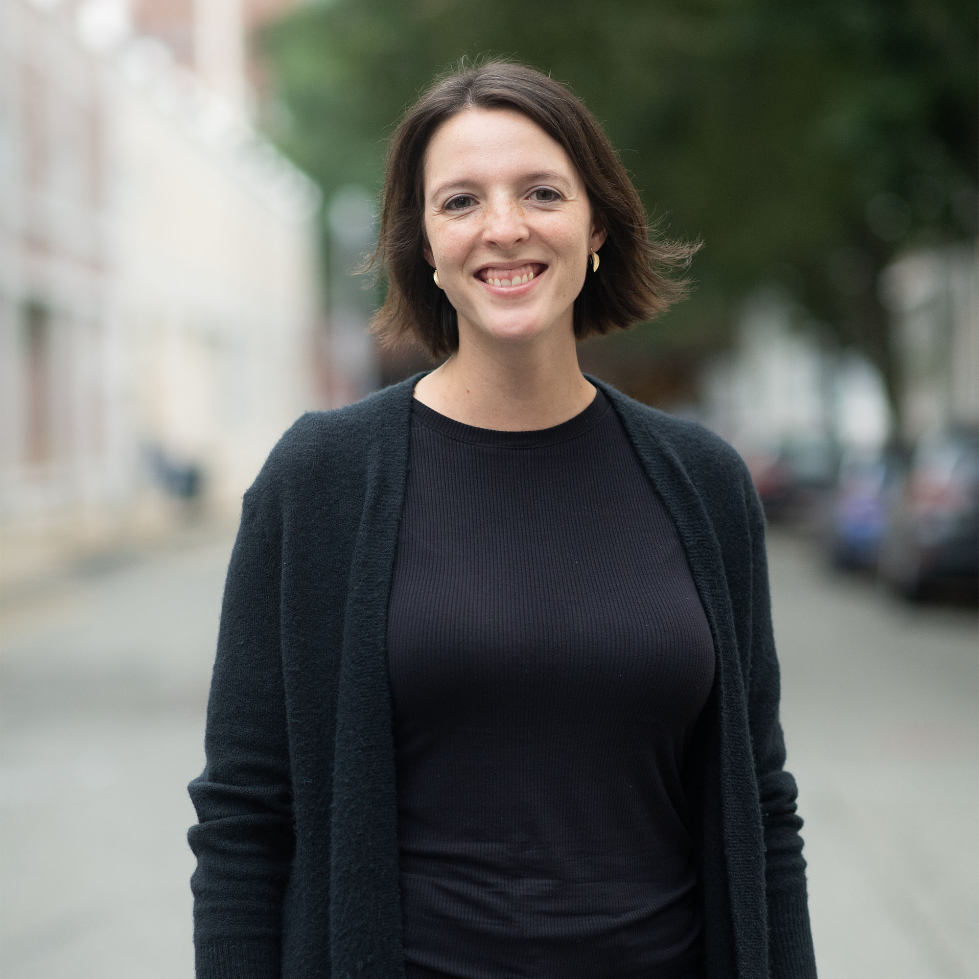 Portrait of Allison McDonald wearing a black cardigan