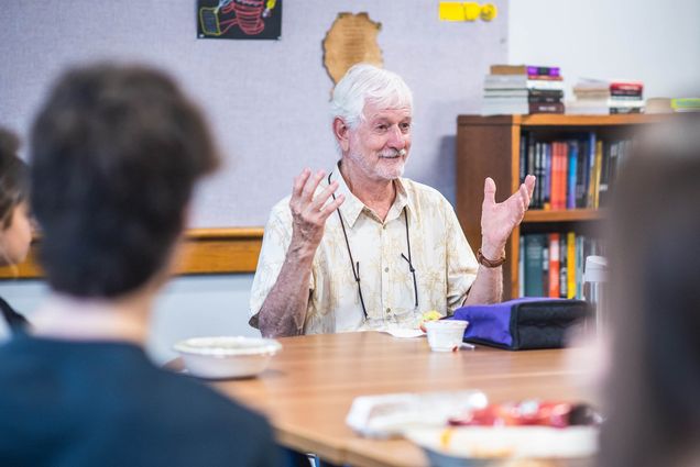 Lawford Anderson, a CAS professor of earth and environment and a longtime petrologist, talks to BU Academy during a Mix It Up event, which gives the high schoolers a chance to learn about professors’ areas of expertise and ask questions about their work and life. Photo by Jackie Ricciardi