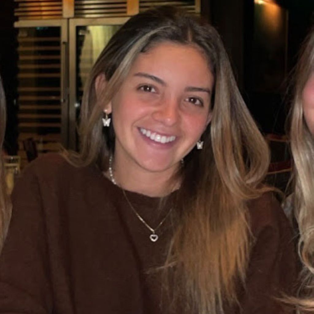 Student, Arianna Castillo, is smiling for a picture in a public setting.
Picture credit: Arianna Castillo (COM'23)