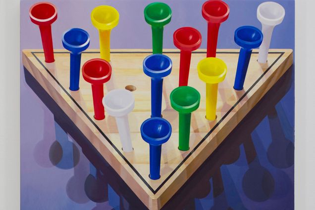 A triangular figure in wooden natural color with pegs like golf tees in various bright colors like red, blue and green. The background is blue with shadows of the golf tee figures.