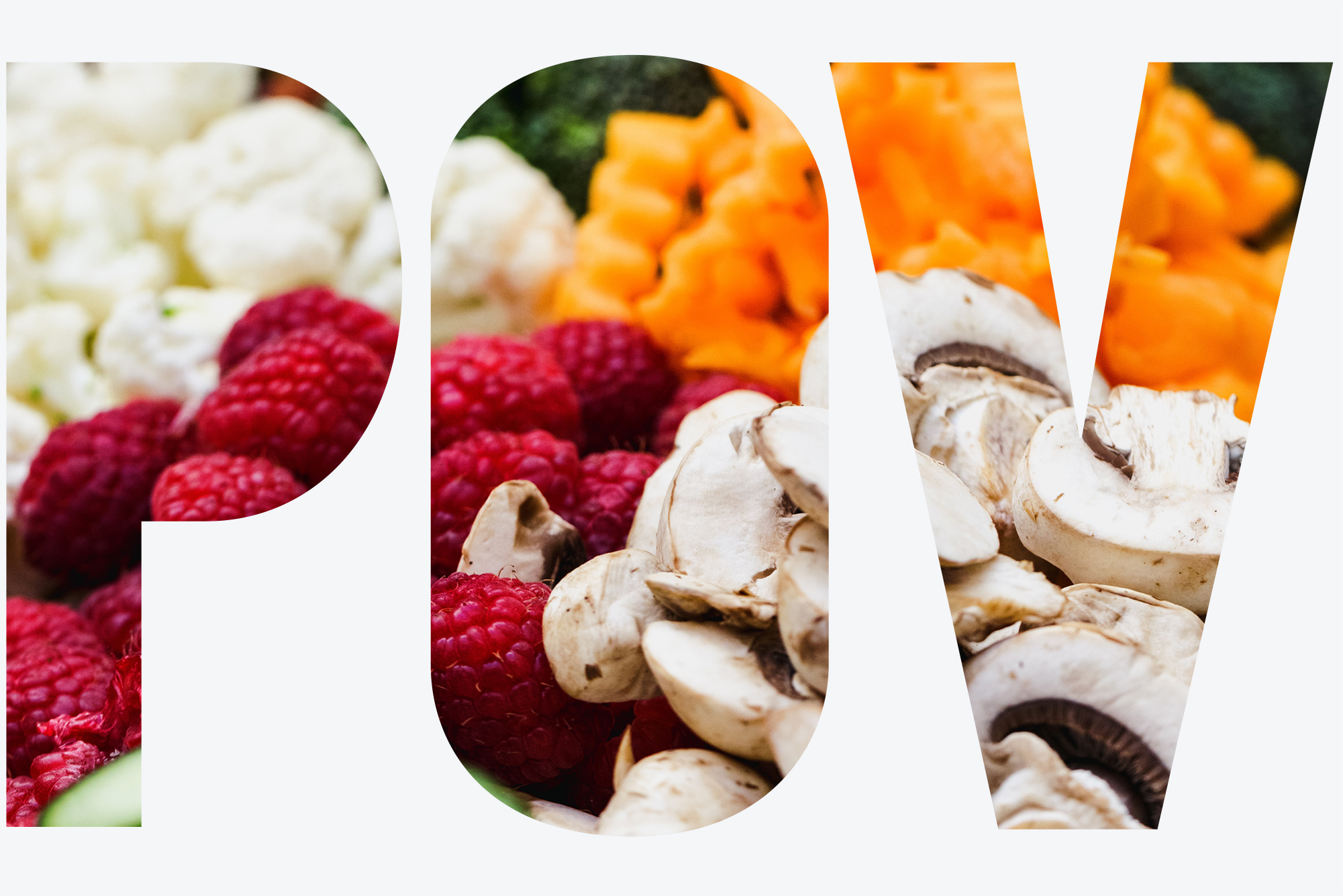 Photo: A zoomed photo of various different vegetables such as mushrooms, carrots, cauliflower, and a handful of raspberries on the lefthand side.