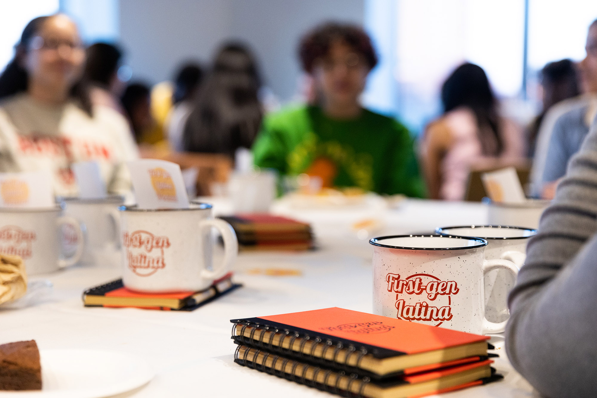 Photo: A table and cups at a table were the party favors for a celebration launching Vicky Plasencia's podcast on the first-generation Latinx experience.