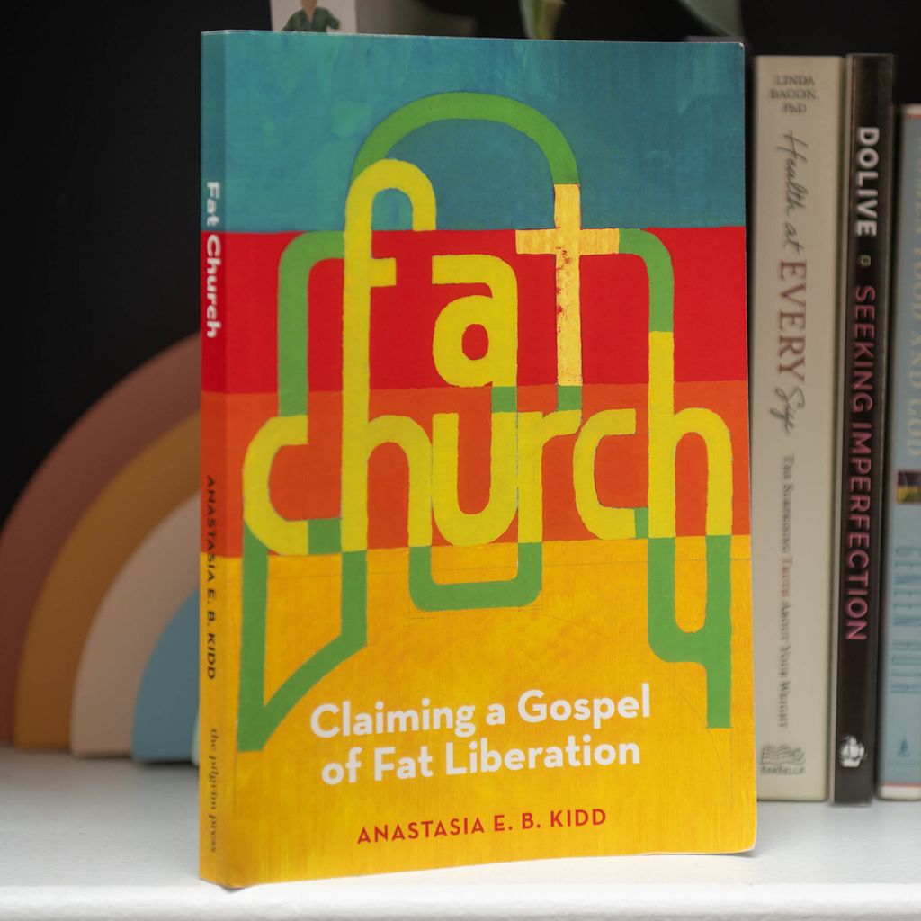 Photo: Cover of the book "Fat Church", with yellow, red, and purple colors surrounding the text