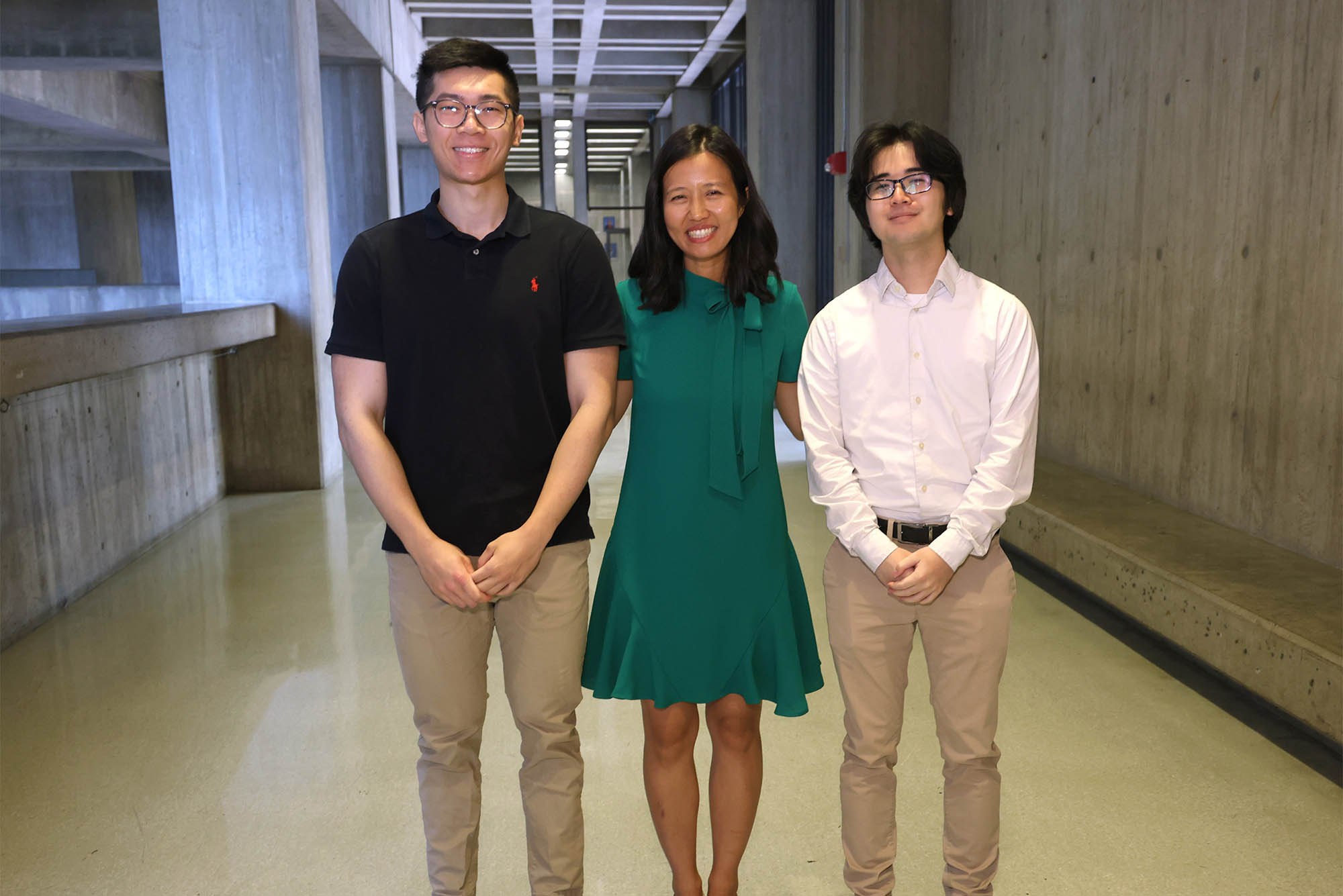 Photo: Boston Mayor Michelle Wu (center) with two of this year’s BU City Scholars Summer Fellows: Kevin Chin (ENG’25) (left) and Jiefu Huang (Questrom’24). All are wearing semi formal attire. Photo by John Wilcox, courtesy of the city of Boston