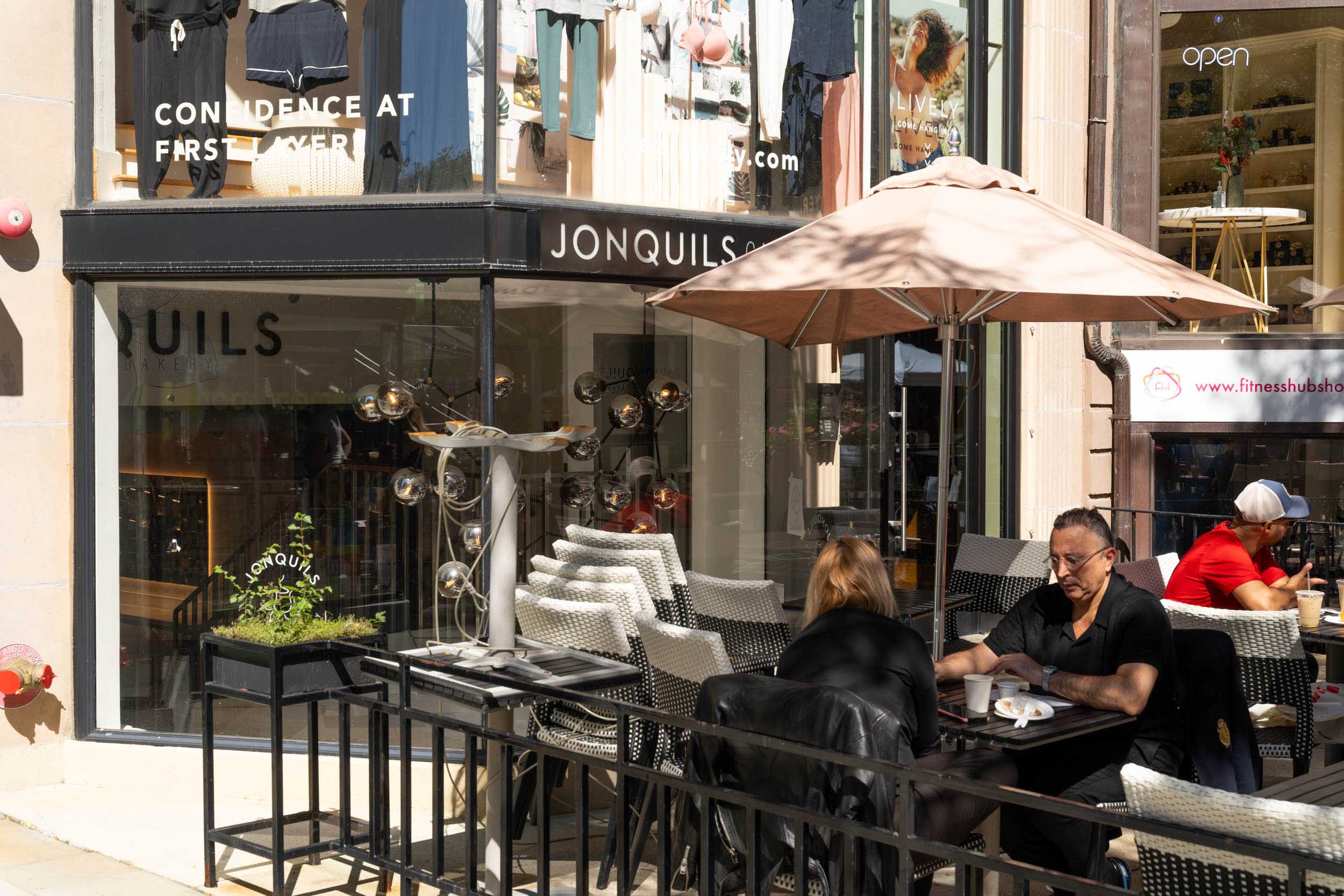 Photo: Jonquils restaurant in Boston, with a sunny patio in front of a brick building