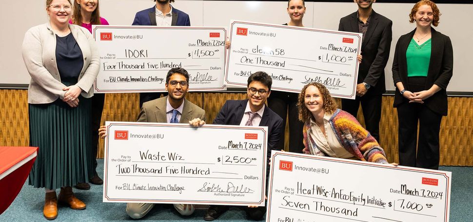 Photo: Students holding check from Innovate@BU