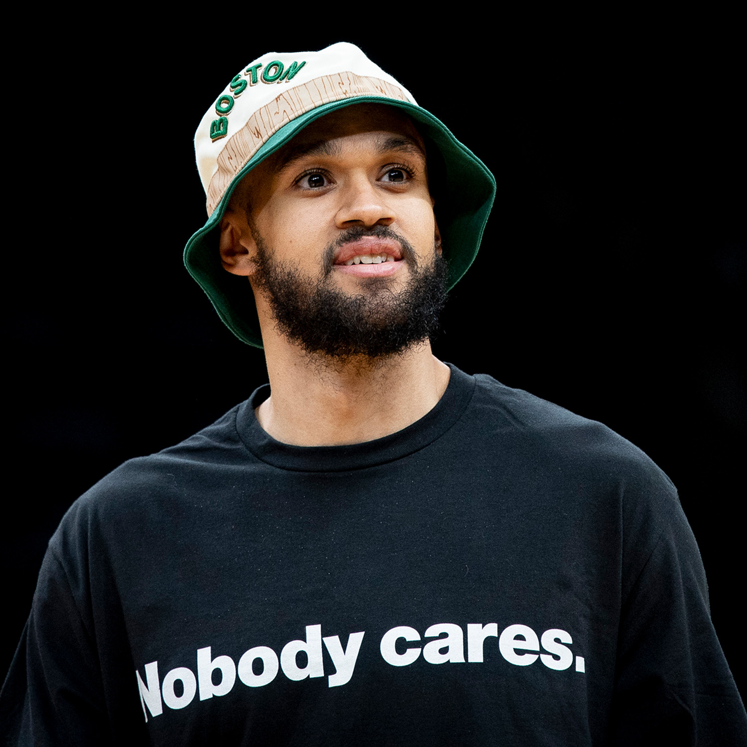 Photo: A picture of Boston Celtics player Derrick White smiling during the Celtics' 2024 Victory Parade