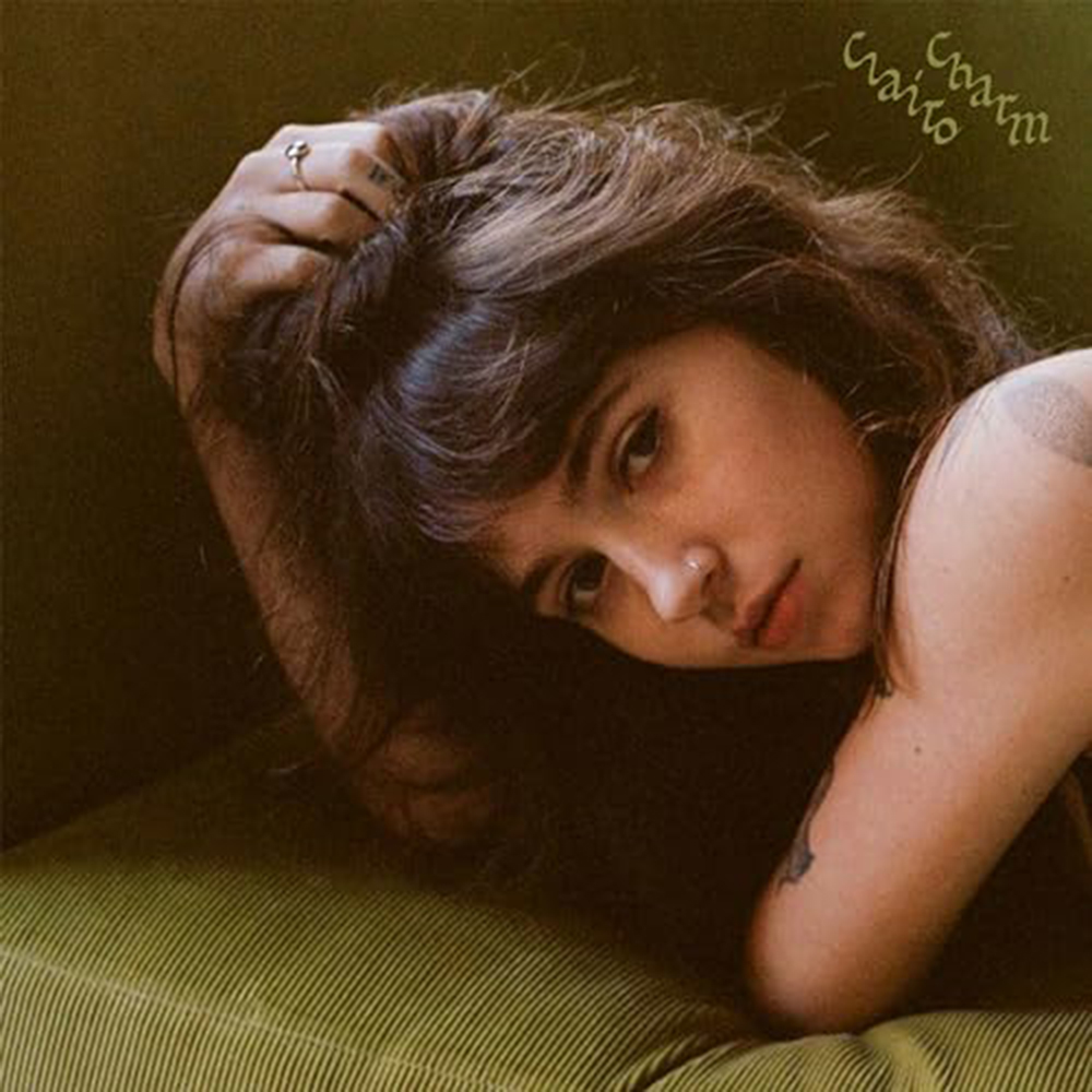 Photo: A picture of Clairo's album cover for "Charm." It features a photo of her looking at the camera