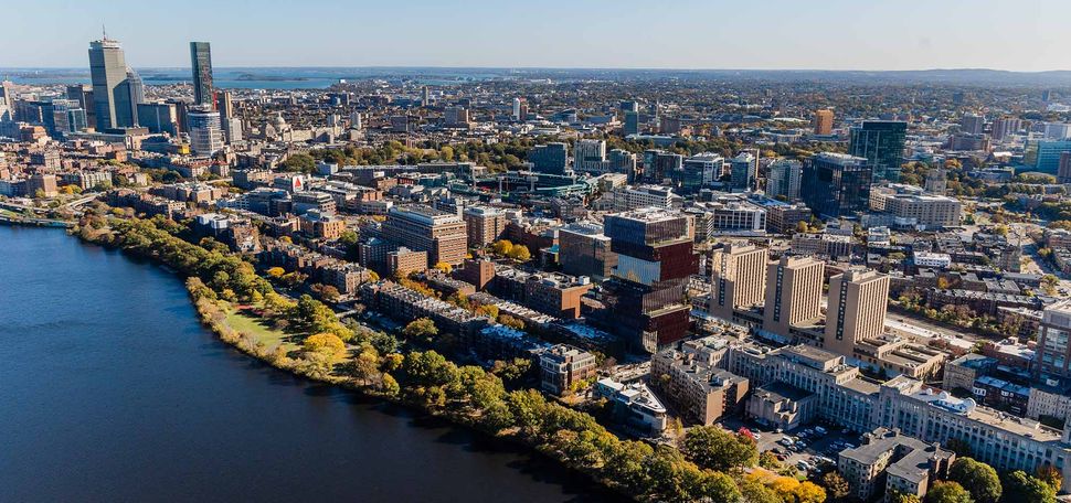 Photo: An aerial view of Boston University, featuring fall foliage and a view of the Charles River