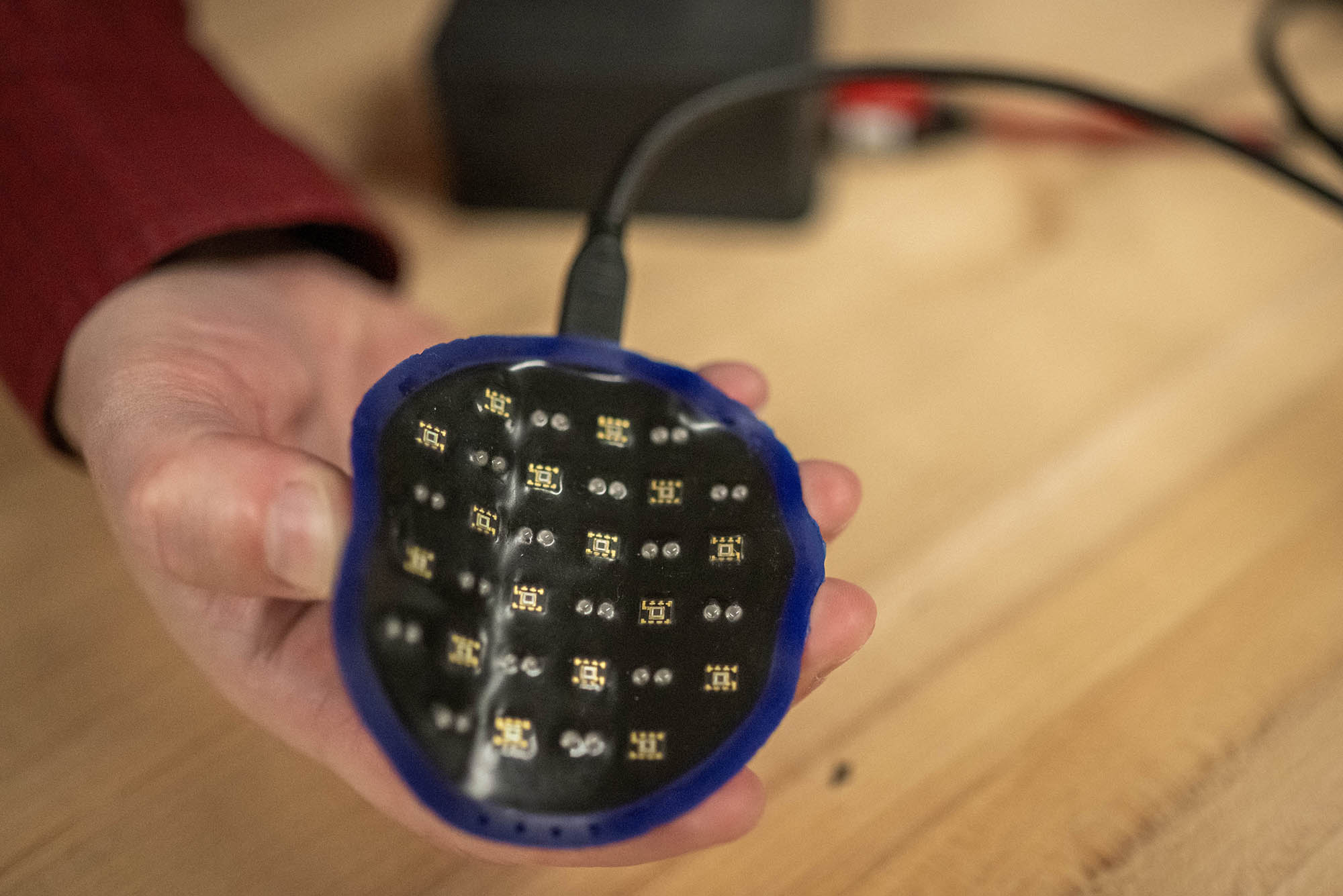 Photo: A circular device, created by Darren Roblyer and his team, to monitor breast cancer treatments