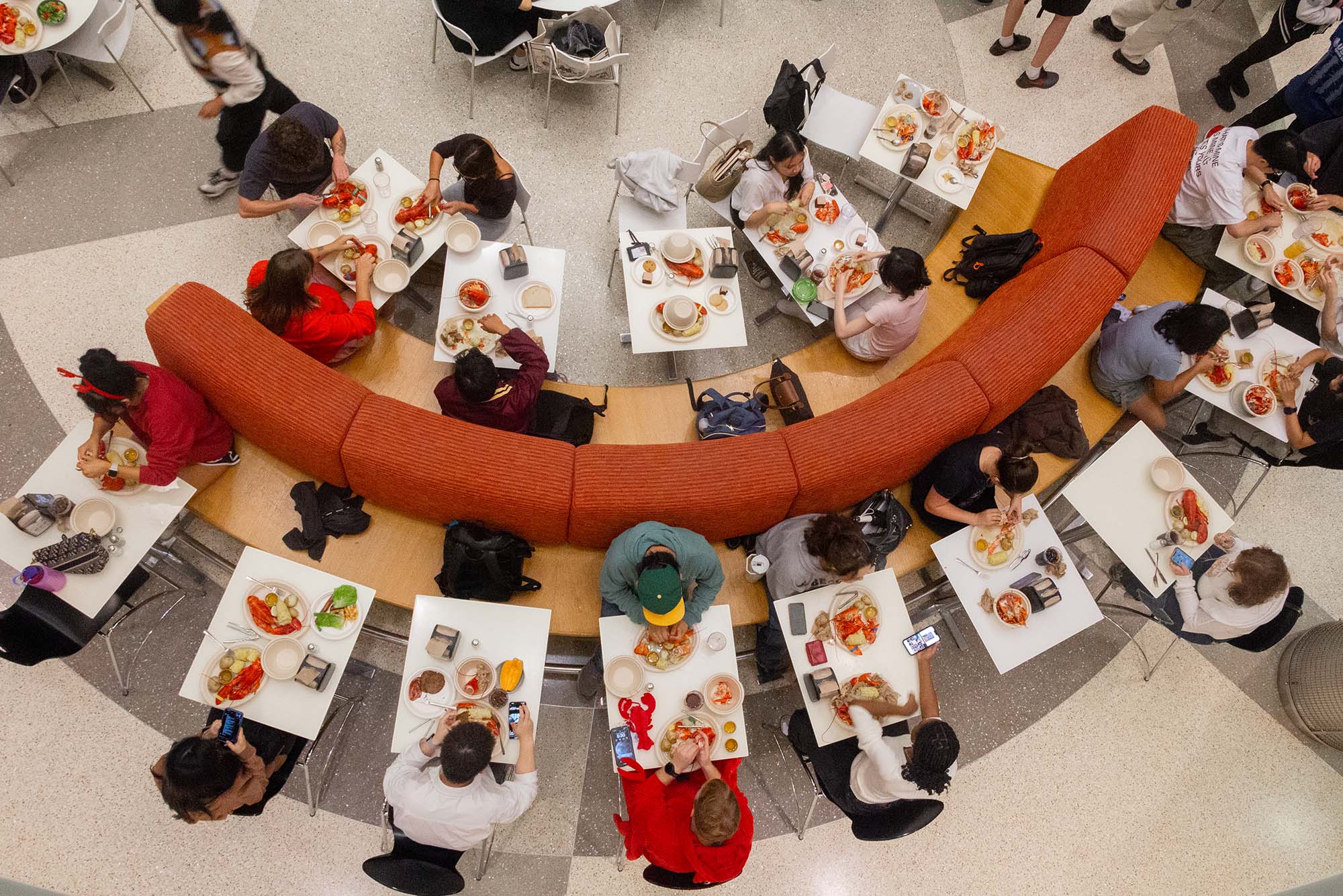 Photo: An aerial shot of a BU dining hall during Lobster Night, with lobsters on the cafeteria tables.